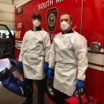 During a recent training, South King Fire members at Station 62 wear personal protective gear, which includes face masks, eye protection, gloves and gowns. Courtesy photo