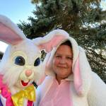 Maggie, right, and her daughter Marianna (in the bunny suit) dressed for the occasion on Easter Sunday to visit local families and share candy. Courtesy photo