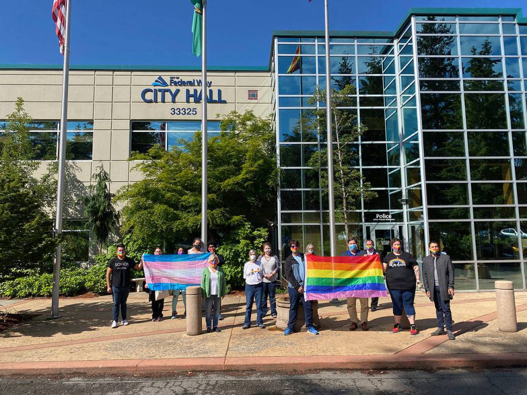 A small group for a historic event gathers at City Hall on Monday, June 1. Olivia Sullivan/staff photo