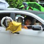 Two Decatur seniors smile as they exit the parade route on June 12.