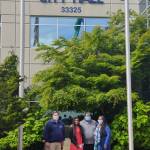 Mayor Jim Ferrell, left, stands with the Rogers family outside of City Hall. Courtesy photo