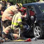 South King Fire and Rescue crews work to extricate victims from a serious vehicle crash in Federal Way on July 12. Photo courtesy of South Sound News