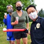Federal Way Police Chief Andy Hwang hands out ice cream to local residents on Aug. 6. Photo courtesy of Bruce Honda