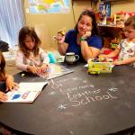 Courtesy photo                                Bri Holt begins the first day of at-home, online learning with her three kids.