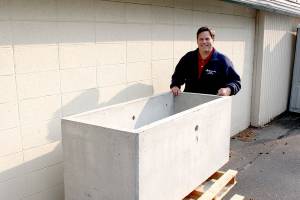 Photo courtesy of the City of Federal Way                                Mayor Jim Ferrell stands next to the citys time capsule, set to be buried in November.