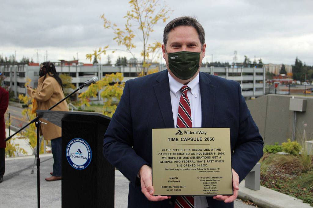Mayor Jim Ferrell holds the time capsule plaque on Nov. 6. Olivia Sullivan/the Mirror
