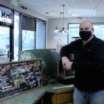 FUSION Executive Board Chair David Harrison stands in Poverty Bay Cafe amid renovations on Nov. 16. The cafe and coffee business was donated to FUSION, who will now use the site as a job skill training option for individuals experiencing homelessness. Olivia Sullivan/the Mirror