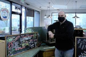 FUSION Executive Board Chair David Harrison stands in Poverty Bay Cafe amid renovations on Nov. 16. The cafe and coffee business was donated to FUSION, who will now use the site as a job skill training option for individuals experiencing homelessness. Olivia Sullivan/the Mirror