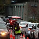 Vehicles fill the Weyerhaeuser King County Aquatic Center parking lot on Wednesday, Nov. 18. Olivia Sullivan/the Mirror
