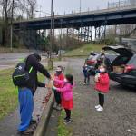 Members of the Jones family hand out food packages on Jan. 18. Courtesy photo