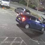 A screenshot from private surveillance footage provided by the Seattle Police Department shows the suspect engaging with the occupants of the vehicle on Feb. 9 in Seattle. The suspect shot two victims, one fatally, before he was killed by Seattle police.