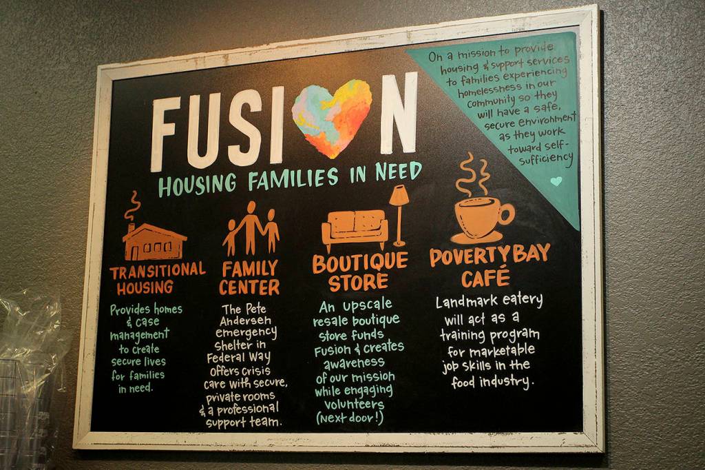 Colorful chalkboards hand-drawn by Kaitlyn Karnes hang throughout the coffee shop. Olivia Sullivan/the Mirror