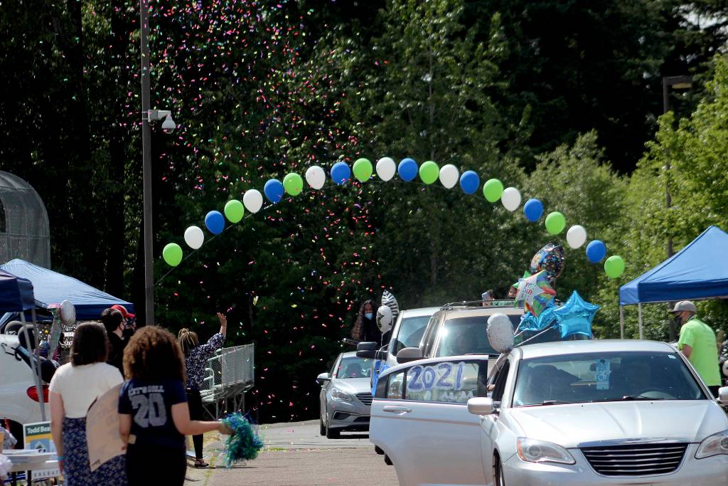 A blast of confetti showers down at the Todd Beamer High School car parade on June 9. Olivia Sullivan/the Mirror