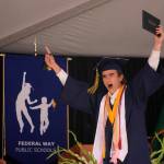Decatur graduate William Forbes, class valedictorian and ASB vice president, cheers in triumph after picking up his diploma on June 12. Olivia Sullivan/the Mirror