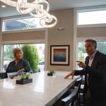 King County Executive Dow Constantine and Auburn Mayor Nancy Backus discuss the plans for the Clarion Hotel in Auburn on Tuesday July 20. The hotel will be used to house approximately 100 people experiencing homelessness in the area as part of the countys Health Through Housing program. Photo by Henry Stewart-Wood.
