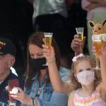 Olivia Sullivan/the Mirror
Leo Thoennes and his family raise their drinks and toys to toast the centenarians.