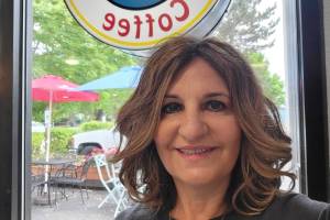 JoAnn Andro at Poverty Bay in Federal Way, where she hosted one of five coffee meet and greets for her volunteers and fostering families. Courtesy photo