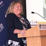 Photo by Andy Hobbs/Federal Way Mirror
Federal Way Chamber CEO Becca Martin greets the audience before giving a State of the Chamber update during the membership luncheon Aug. 4 at the Performing Arts and Event Center.