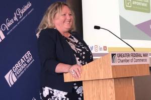 Photo by Andy Hobbs/Federal Way Mirror
Federal Way Chamber CEO Becca Martin greets the audience before giving a State of the Chamber update during the membership luncheon Aug. 4 at the Performing Arts and Event Center.