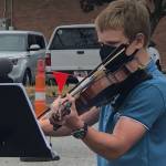 Cadence Reas performs Aug. 7 at the Federal Way Farmers Market. Photo by Andy Hobbs/Federal Way Mirror