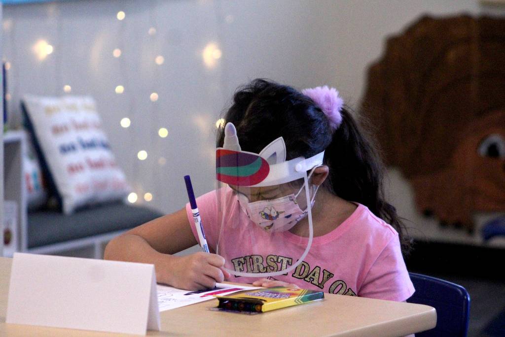 A Mirror Lake student wears a mask and a face shield on the first day of school Sept. 1. Olivia Sullivan/the Mirror