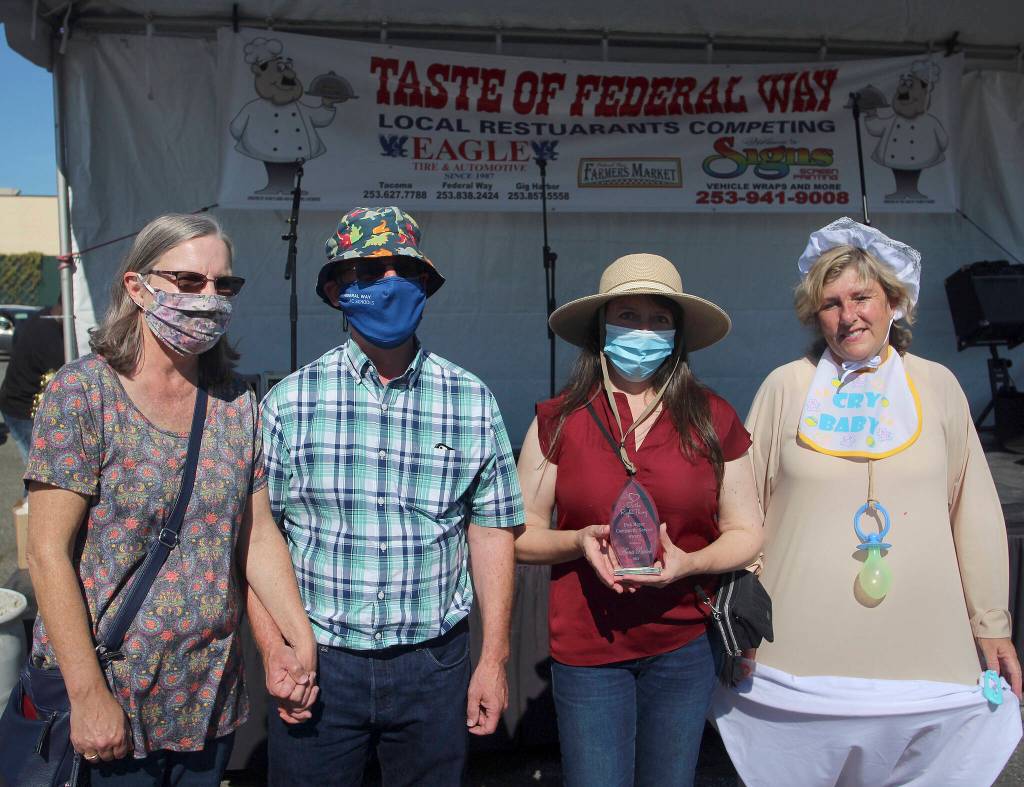 Anna Patrick, third from left, won the annual Dick Mayer Community Award on Sept. 25.