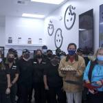 Crumbl Cookies franchise owners and employees stand for a photo with Mayor Jim Ferrell, Chamber CEO Rebecca Martin and Council President Susan Honda. Olivia Sullivan/the Mirror