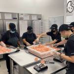 Crumbl Cookies employees making cookies on Oct. 5. Olivia Sullivan/the Mirror
