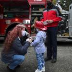 Andrea Graham, left, shows Arianna the Whitney Bellinghausen Community Service Award on Oct. 14. Olivia Sullivan/the Mirror