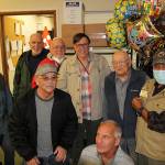 Hank Lazzar smiles for a photo with fellow volunteer drivers of the MSC. Olivia Sullivan/the Mirror