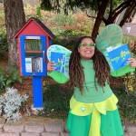Tooth Fairy Jasmine dropped off copies of the new book at a Little Free Library in Federal Way on National Brush Day. Nov. 1. Courtesy photo