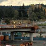 Olivia Sullivan/the Mirror 
Construction workers work on the final stop of the Federal Way Link Extension light rail route along S. 320th Street in Federal Way on Nov. 19.