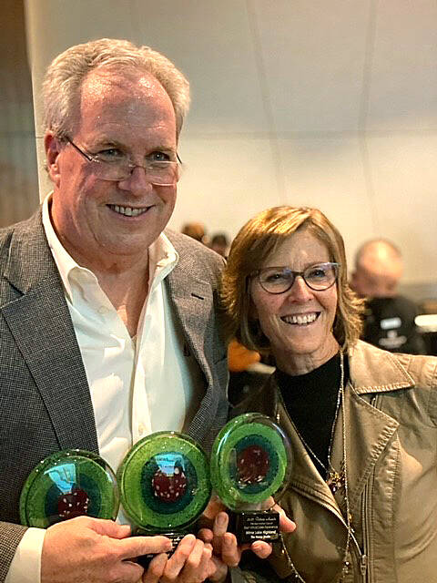 William and Dawn McCaffrey of The Nexus Studio holding their New Home Council Tribute awards. Courtesy photo