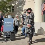 Elaine Simons, former foster mother of Jesse Sarey, addresses a crowd outside the Maleng Regional Justice Center on Aug. 24, 2020, moments after Auburn Police Officer Jeff Nelson was formally charged with second-degree murder and first-degree assault in the May 31, 2019, shooting death of 26-year-old Sarey in front of a north Auburn convenience store. File photo
