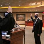 Jack Walsh sworn into his council seat by Judge Dave Larson on Dec. 7. Olivia Sullivan/the Mirror