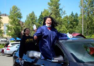 A Todd Beamer High School senior shouts in jubilation at the schools car parade on June 9 leading into graduation weekend. Olivia Sullivan/the Mirror