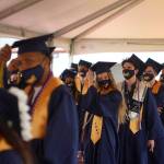 Decatur graduates move their tassels from right to left on June 12. Olivia Sullivan/the Mirror