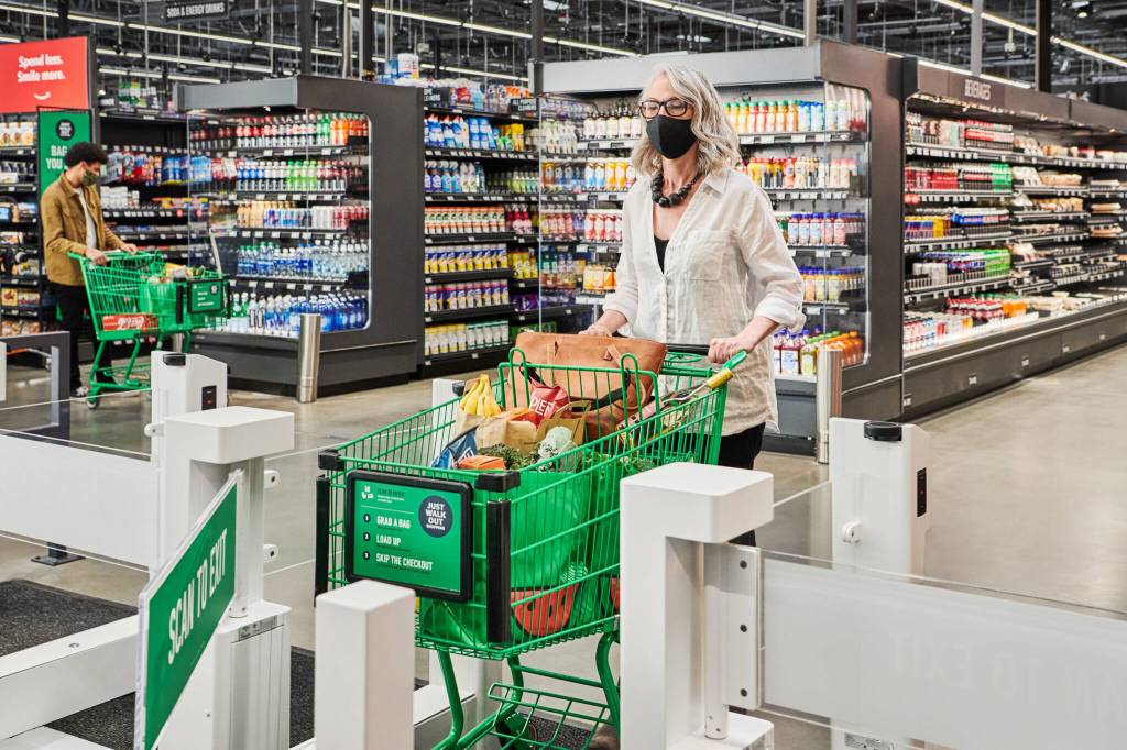 Just Walk Out technology allows customers to add items to their cart and skip the checkout lines. Photo courtesy of Amazon