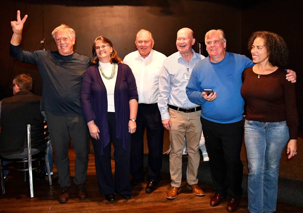 L-R: School board candidate Quentin Morris and Lakehaven commissioner candidate Laura Belvin stand with city council candidates Jack Dovey, Jack Walsh, Daniel Miller and Erica Norton on Nov. 2. Photo courtesy of Bruce Honda