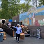 Olivia Sullivan/the Mirror
Kae Lee directs volunteers at the food bank on April 29, 2021. The Federal Way Senior Center Food Bank is open Mondays and Thursdays from 9 a.m. to noon.