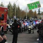 The motorcade bringing the President to the college passes through the intersection of SE 320th Street and 124th Avenue SE in Auburn. Photo by Alex Bruell/Sound Publishing