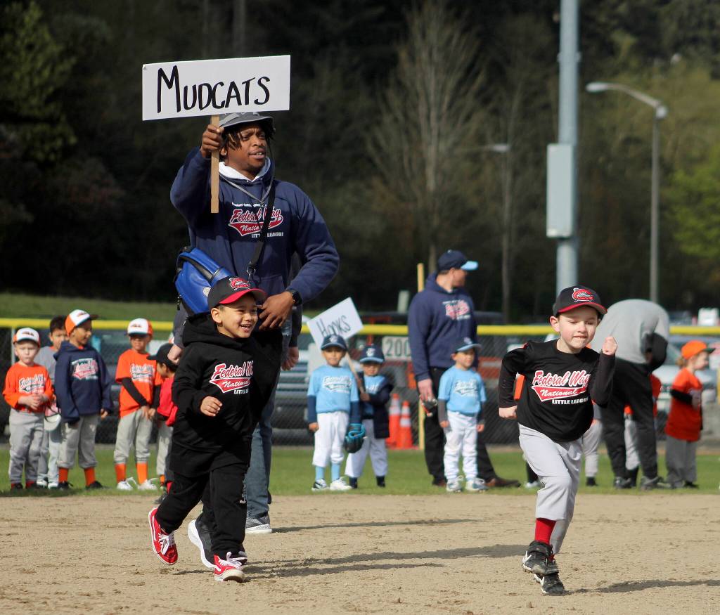 Players run the bases on April 23. Olivia Sullivan/the Mirror