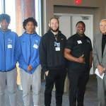 Lenny Wilkens and Pete von Reichbauer (far right) with the Federal Way High School boys basketball coaches and team. Photo courtesy of the South King County Scholar Athlete Fund