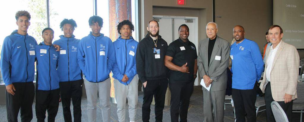 Lenny Wilkens and Pete von Reichbauer (far right) with the Federal Way High School boys basketball coaches and team. Photo courtesy of the South King County Scholar Athlete Fund