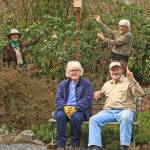 Linda Carlson (sitting, left), Ken Schroeder (sitting, right), Barbara Peterson (standing, left) and Jay Galvin (standing, right) of the Rainier Audubon Society pose in front of a nest box placed at Soos Creek Botanical Gardens. Photo courtesy of Jay Galvin.