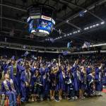 Todd Beamer High School graduates throw their caps in the air on June 12. Photo courtesy of Federal Way Public Schools