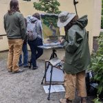 Kimberly Trowbridge painting Tucker Oak Bonsai at the Pacific Bonsai Museum on June 18. Sarah Fox/Sound Publishing