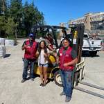 Hanna Banks with Lowes employees. Photo courtesy of Hanna Banks