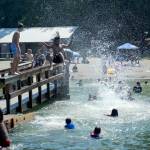 Jonah Tauiliili-Tunupopo, 16, jumps into Steel Lake on June 28, 2021. Olivia Sullivan/the Mirror