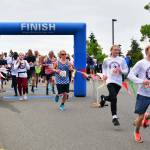 Participants take off from the starting line on July 4. Photo by Bruce Honda